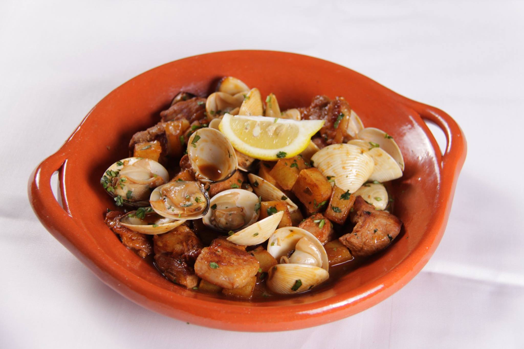 Flamingo: Fried pork and potatoes with clams in white wine sauce
